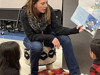 teacher reading to students